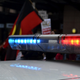 Police car’s lights during a protest.